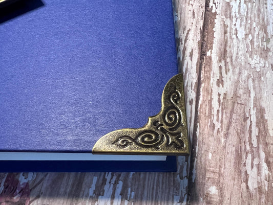 Antique style metal filigree book corners for handmade and treasured books 1 1/8 inch (etsy image id: 7819009861)