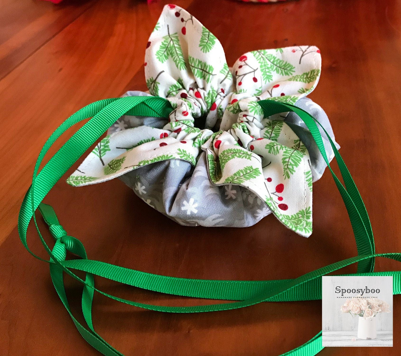 drawstring lined bag for carrying small glass bottles like essential oils. features elastic on the inside to hold bottles in place and a grosgrain ribbon to pull your bag closed. inside is a slightly holiday design fabric in white with small print pi (etsy image id: 1682787260)