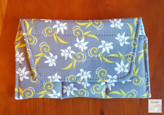 Grey background fabric small bottle pouch fits 3 bottles, features white flowers with yellow stylized swirls (etsy image id: 1690577724)