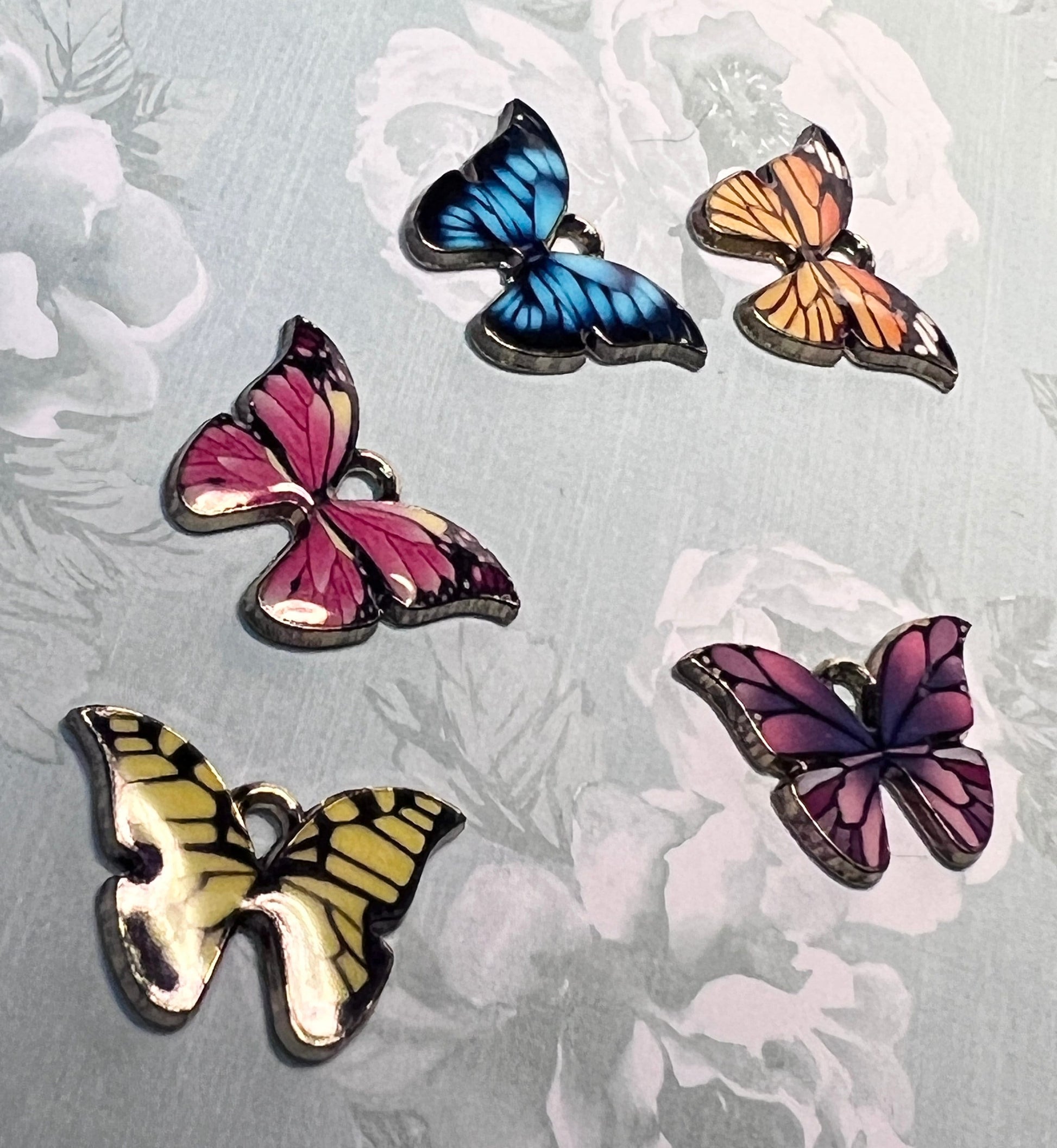 Multi colored butterfly charms with gold tone backs, set of five, five colors (etsy image id: 4888750167)