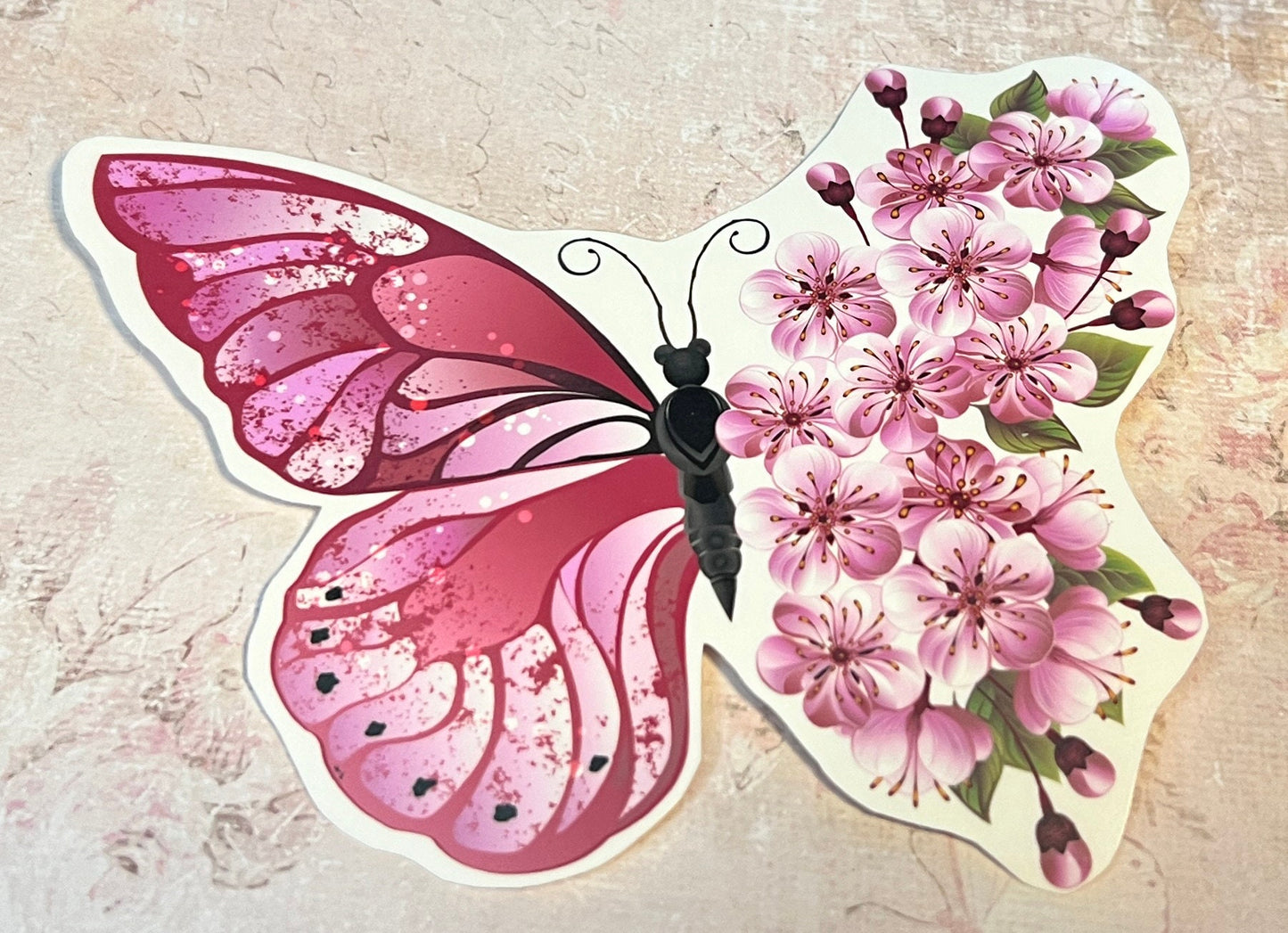 Set of 4 Butterfly stickers, one side of the Butterfly is a butterfly wing and the other side is a floral style wing. There is a pink butterfly (etsy image id: 5603910092)