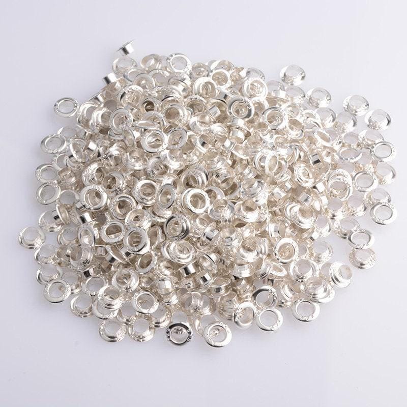 Silver 5mm bead cores for paper bead making this picture depicts a pile of sterling silver bead cores (etsy image id: 7760607356)