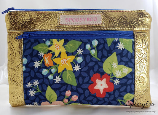 Blue Floral Cosmetic Bag: Gold Vegan Leather Clutch (etsy image id: 7760616976)