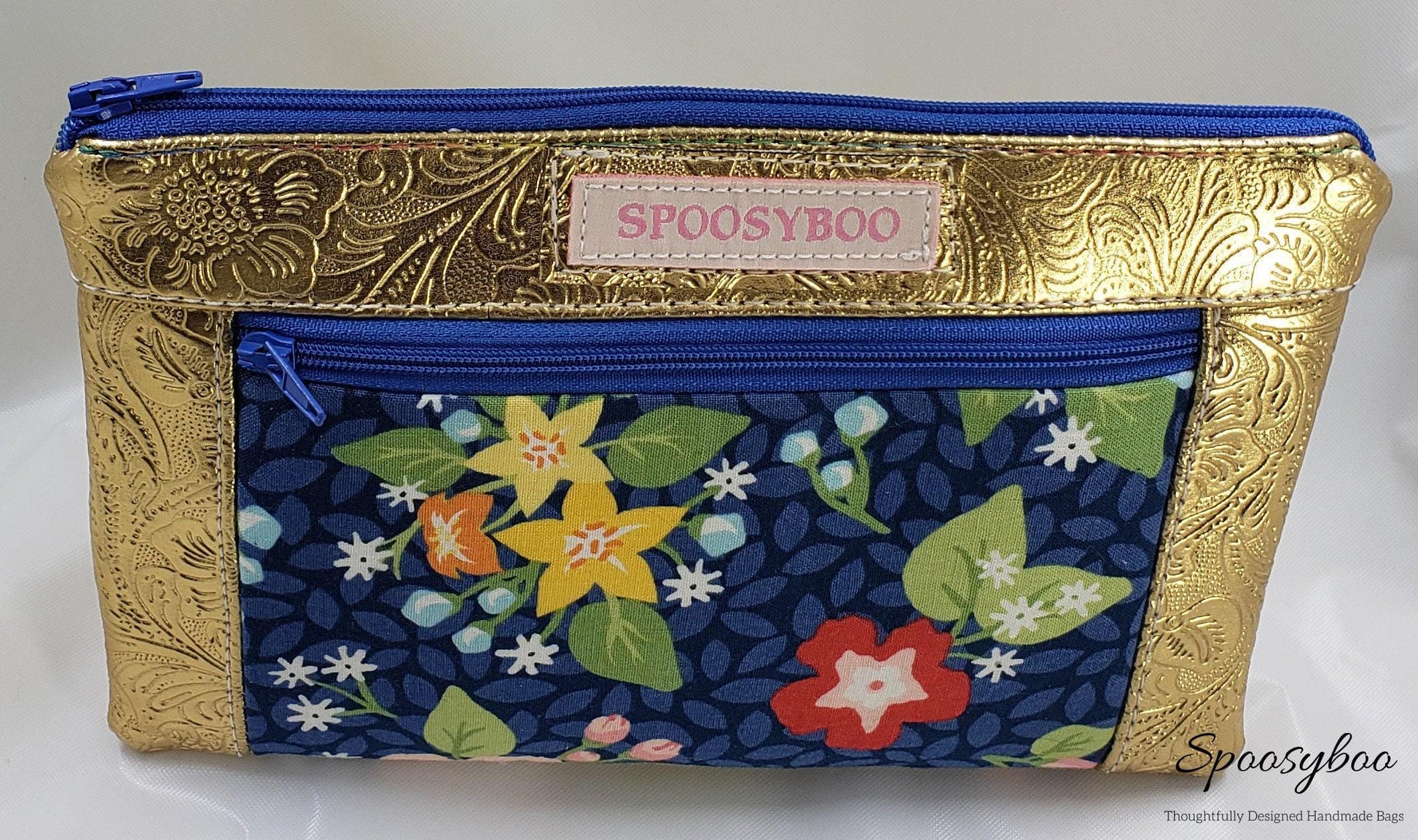 Blue Floral Cosmetic Bag: Gold Vegan Leather Clutch (etsy image id: 7760617116)