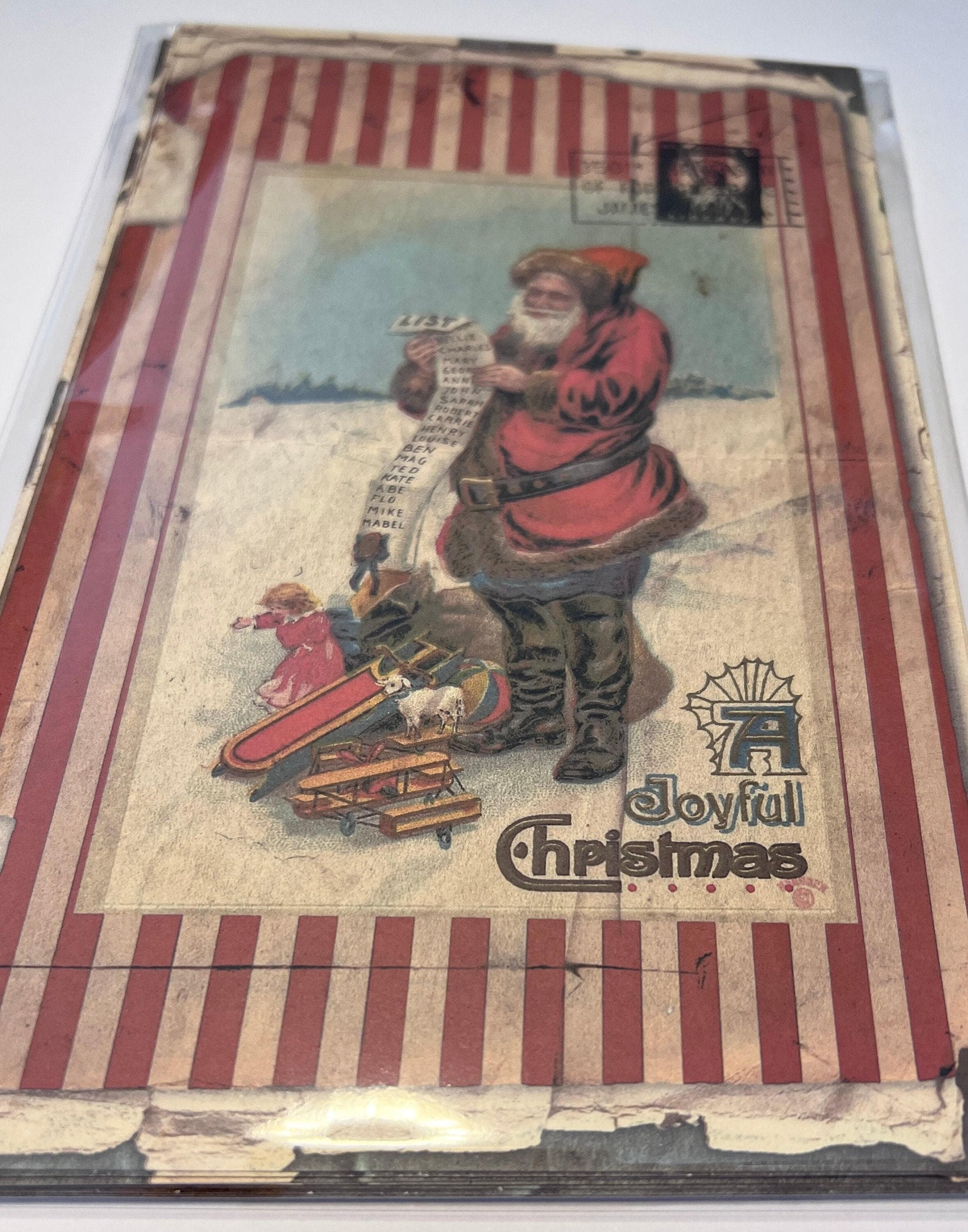 shows one large vintage images on vinyl sticker medium in reds and white with Santa (etsy image id: 7760622354)