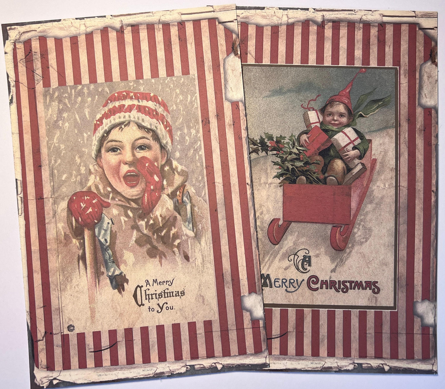 shows two large vintage images on vinyl sticker medium in reds and white with Santa and boy in red striped knit cap (etsy image id: 7760622496)