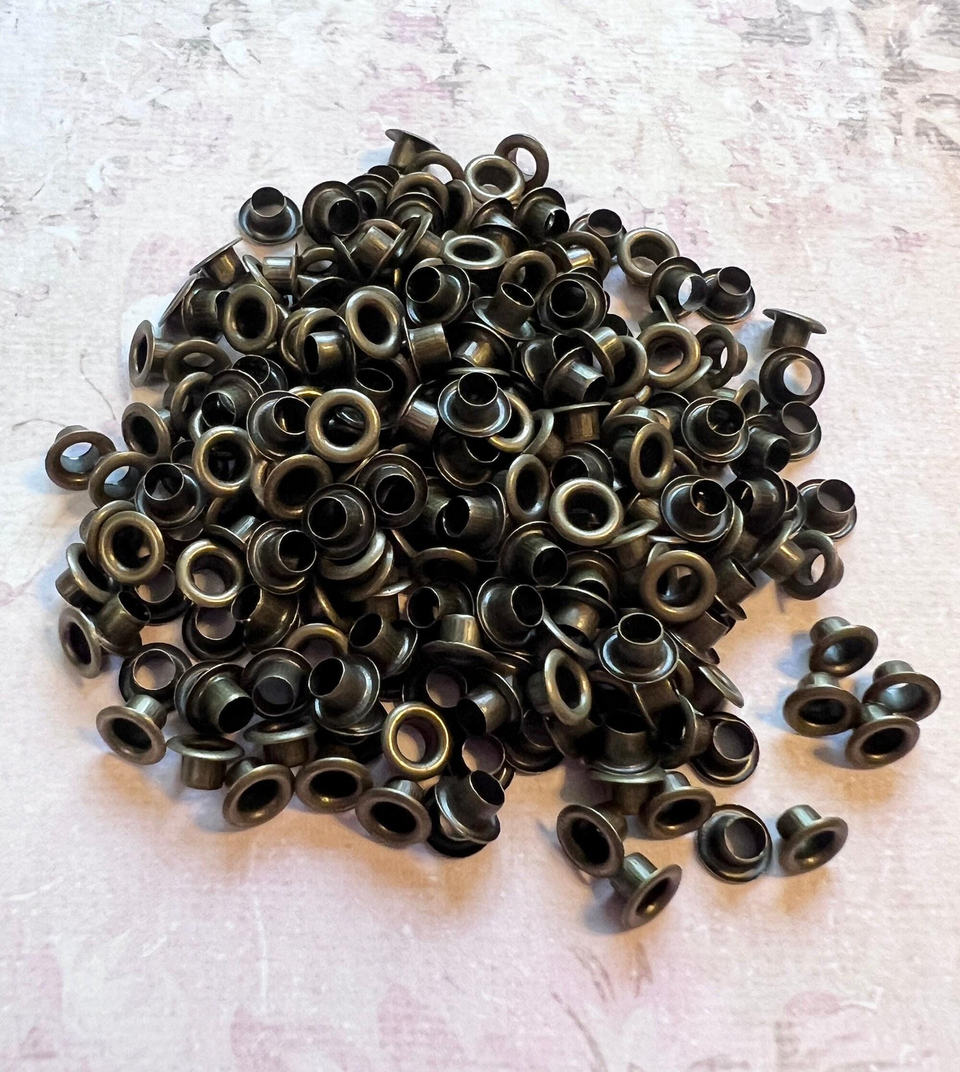 This image is of a pile of antique brass 3mm bead caps (etsy image id: 7763957542)