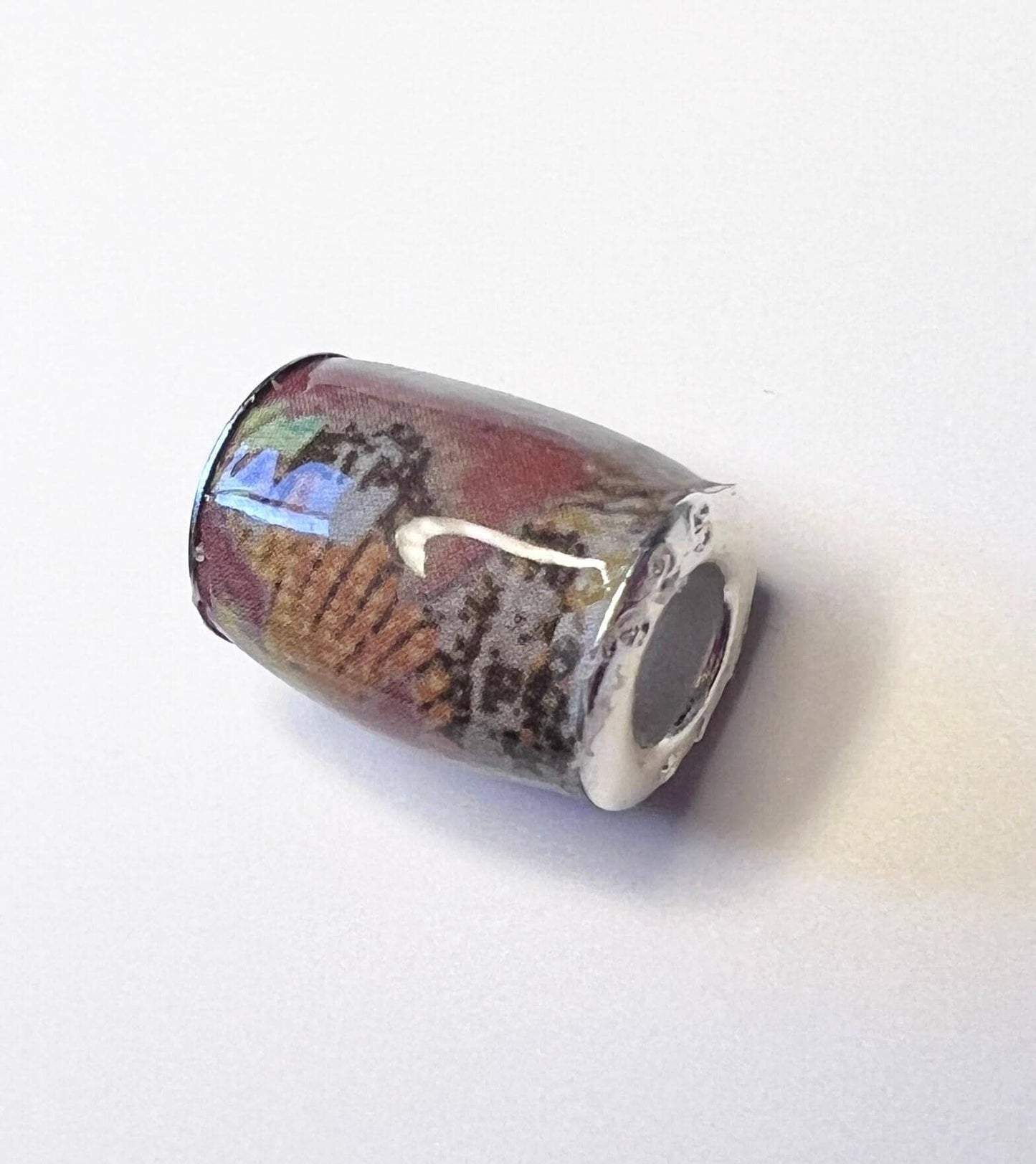 Silver 5mm bead cores for paper bead making, bead hardware, this image shows a finished high glass paper bead with the sterling silver bead cores (etsy image id: 7808554799)