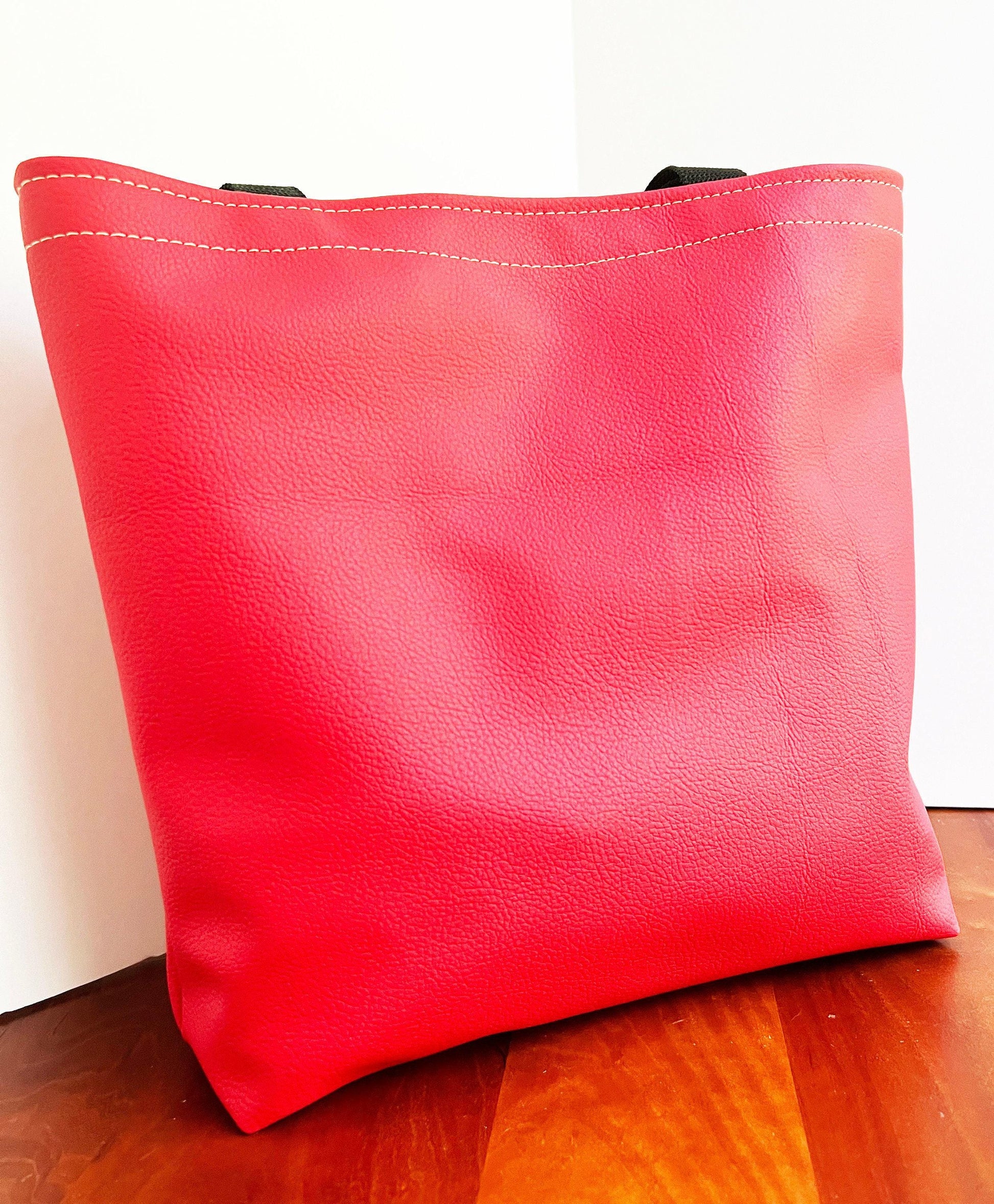 Soft red Vinyl Tote bag with Black 1 inch nylon handle (etsy image id: 7808559805)