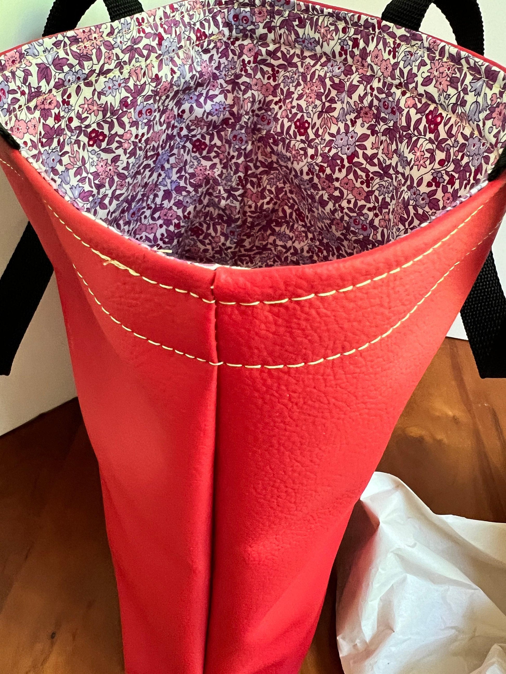 Soft red Vinyl Tote bag with Black 1 inch nylon handle and red and purple lined interior. (etsy image id: 7808559871)